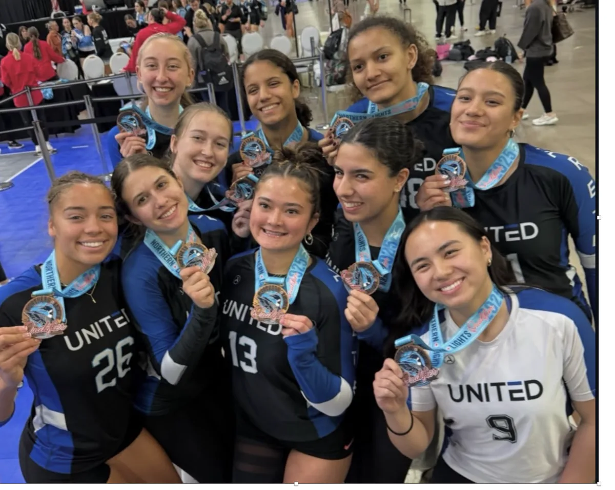 United TX club team celebrating with medals at the Northern Lights Qualifier